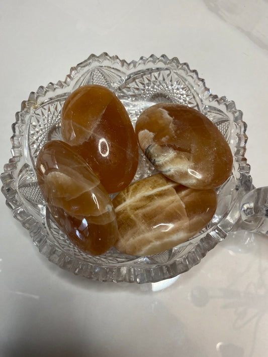 Honey ๐ฏ Calcite Palm Stone